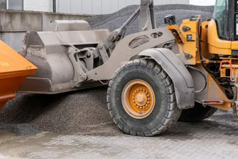 Loader filling a truck
